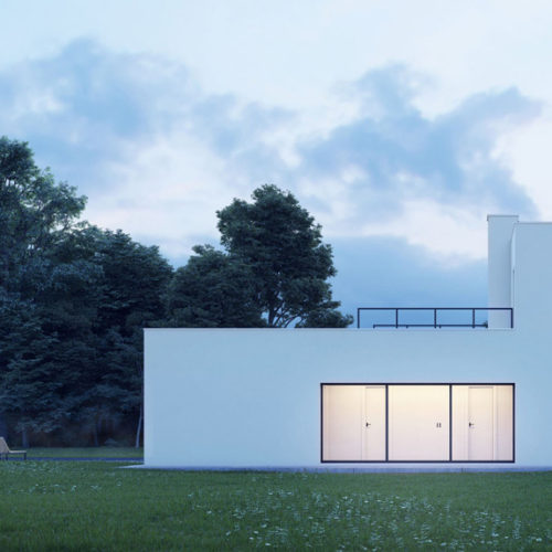 Dusk view of a modern minimal design white house in nature