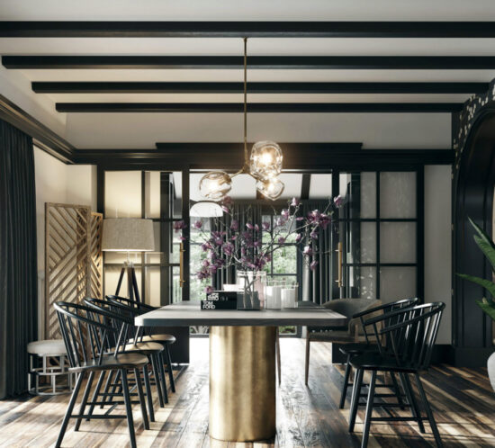 countryside house interior with massive brass dining table and black wooden chairs