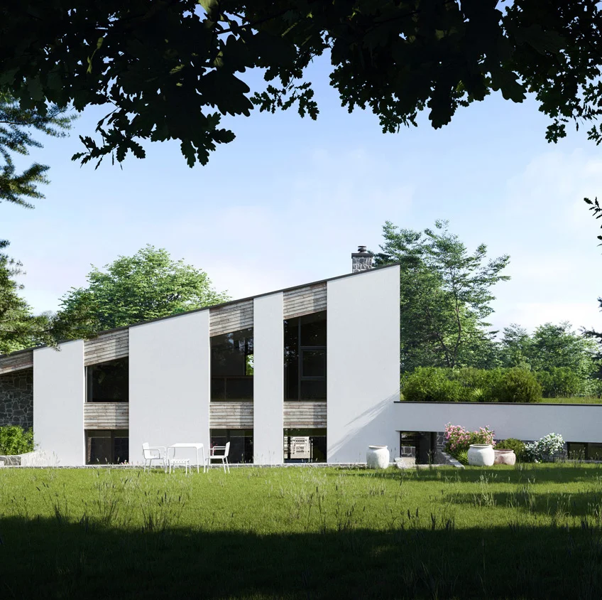 white modern sloped house exterior in a green environment